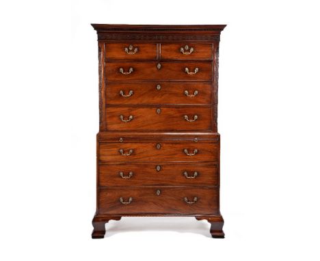 A George III mahogany chest on chest, circa 1770, the stylised dentil moulded cornice above a blind fretwork frieze and two s