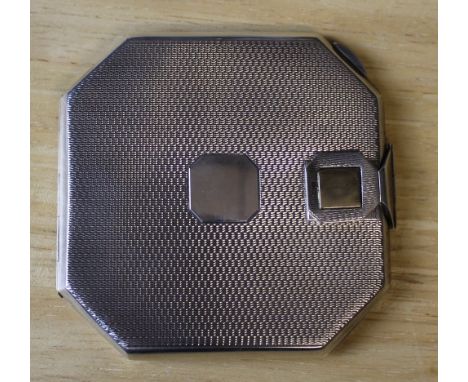 A Walker & Hall silver powder compact, of canted square form with engine-turned decoration, marks for Chester 1941, 8cm x 7.5