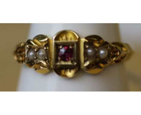 A Victorian 15ct gold ruby and seed pearl ring, ring size M