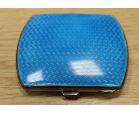 An Edward VII silver and blue guilloche enamelled cigarette case, Birmingham, 1909