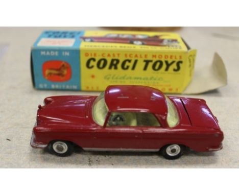 A Corgi 230 Mercedes 220 SE Coupe including spare wheel-scratch to roof