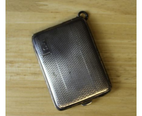 A George V silver Vesta case, with engine turned body, 6.5cm x 4.5cm, Birmingham 1933, weight 31grams