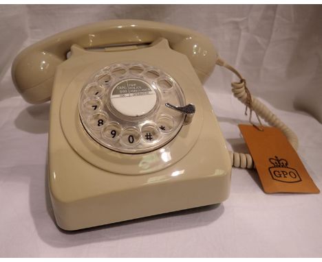 Ivory rotary telephone. P&amp;P Group 1 (£14+VAT for the first lot and £1+VAT for subsequent lots) 