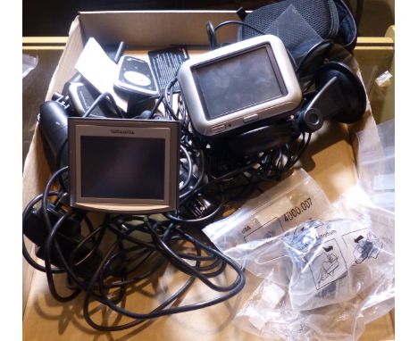 Two TomTom satnavs and accessories. P&amp;P Group 2 (£18+VAT for the first lot and £3+VAT for subsequent lots) 