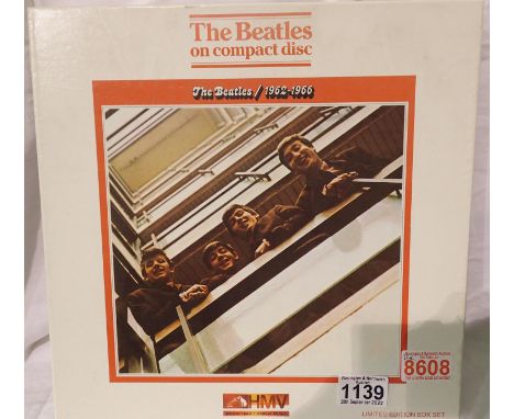 Beatles on compact disc limited edition boxed set with book and poster, lacking CD. Not available for in-house P&amp;P 