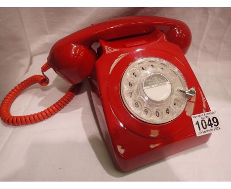 Red 1960/1970s style rotary telephone, compatible with modern telephone banking and any standard analogue landline, boxed. P&