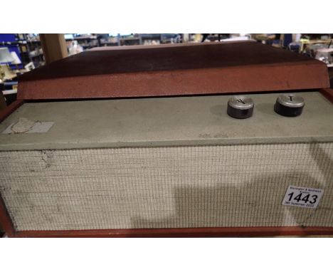 Vintage record player in red leatherette case. All electrical items in this lot have been PAT tested for safety and have pass
