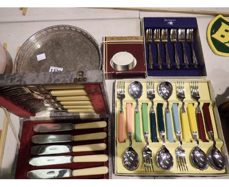 Mixed flatware including a silver plated coaster set. Not available for in-house P&amp;P 