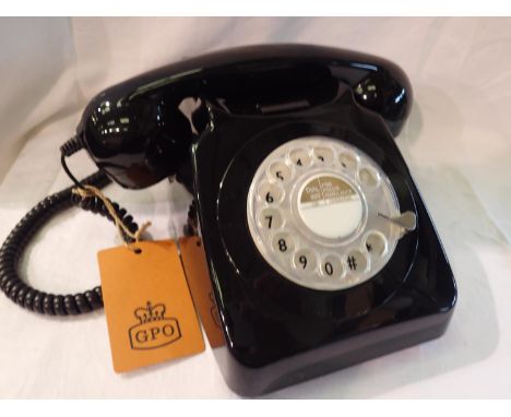 Black 1960/1970s style rotary telephone, compatible with modern telephone banking and any standard analogue landline, boxed. 