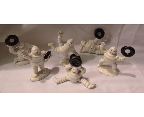 Six cast iron Michelin Men, each H: 80 mm. P&amp;P Group 1 (£14+VAT for the first lot and £1+VAT for subsequent lots) 