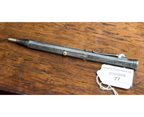 A 20th Century white metal combination four colour propelling pencil, the body with engine turned decoration, marked 'Sarastr