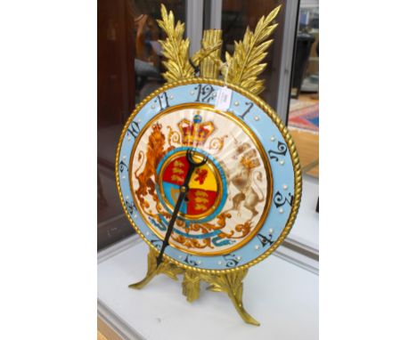A cast metal easel clock with Royal coat of arms