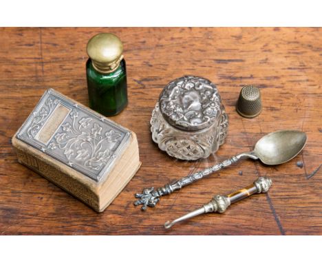 An Edwardian book of Tennyson's Poems with silver cover, Birmingham 1907, together with a green glass scent bottle, button ho