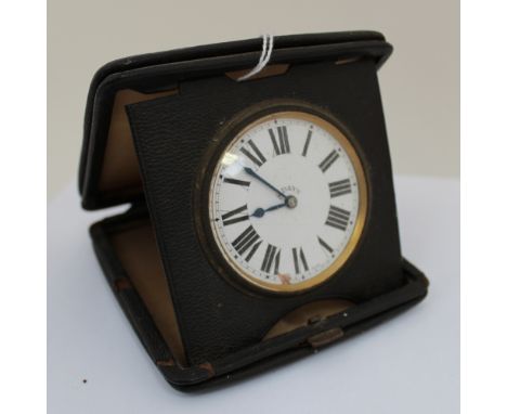 An eight-day travel clock with enamel dial, late 19th/early 20th Century