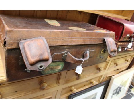 Vintage leather steamer trunk 75cm x 48cm (inc handle) x 24cm, embossed with initials 'H.C.T', bearing original destination s