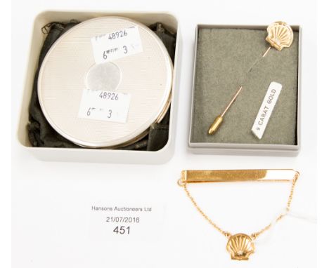 Two 9 ct tie pins with scallop motifs and a 1970s silver engine turned compact (3)