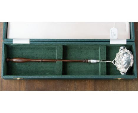A cased silver and turned wood punch ladle in a Georgian style, hallmark C.J. Vander, London, 1976, approx. length 40 cm