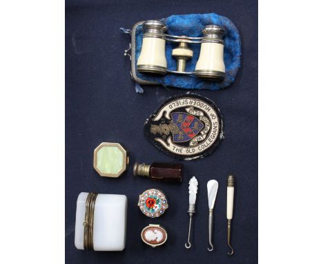 A 19th Century French glass and gilt metal dressing table box and contents an over glazed glass perfume phial, three button h