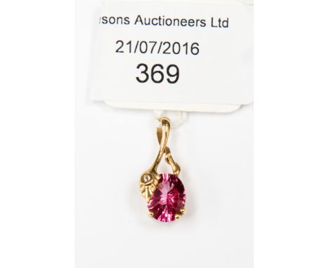 A pink topaz pendant, large stone with small diamond, 9 ct gold setting 