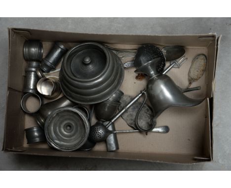 A box of assorted pewter smalls, including cream jug, flatware, pickle fork, napkin rings, caster etc