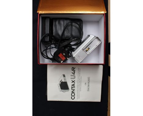 A Japanese digital Contax U4R camera Kyocera corporation with all equipment for function and operations manual