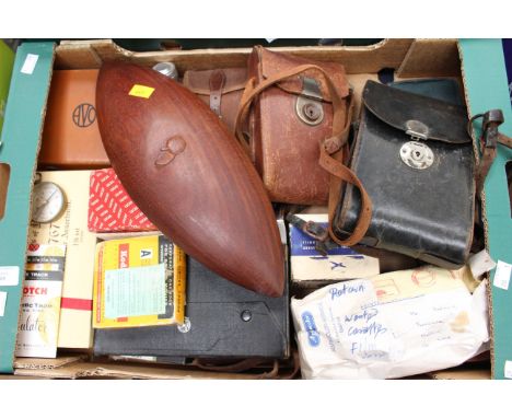 A box of assorted items including mahogany bowl, brushes, kodak camera, compass, ebony miniature barrel, plus many others