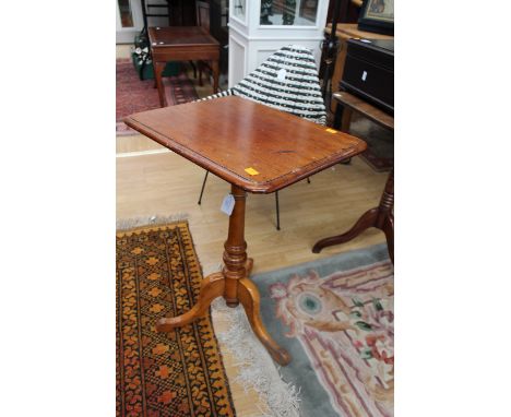 A 19th Century mahogany topped tripod table