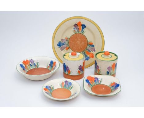 Clarice Cliff for Newport Pottery and Wilkinson, 'Crocus' two jam pots, one side plate one bowl, two pin dishes