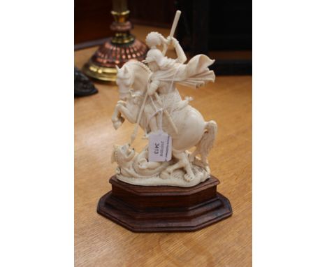 An ivory figurine of 'George and the Dragon',  provenance; came back from Burma (WW2), serving in the Navy, 1945