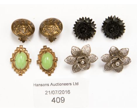 A collection of earrings, black jet type clips; army button clips, filigree silver and Edwardian clip earrings 