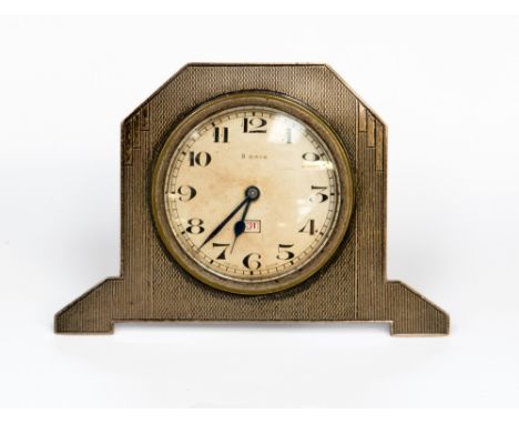An Art Deco silver bedside calendar timepiece, engine turned, stepped design, Adie Brothers, Birmingham 1932, 8cm high