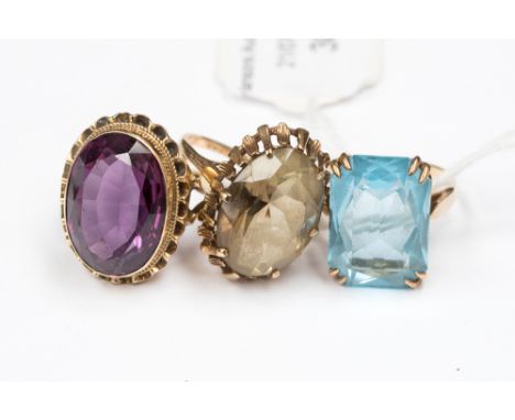 Three 9 ct. gold stone set dress rings, to include amethyst, blue topaz and citrine, ring size Q, P x 2, gross weight 17.8 gr