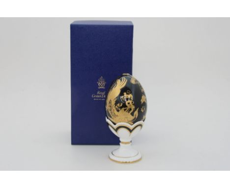 A Royal Crown Derby black 'Old Avesbury' egg and cup in original box 