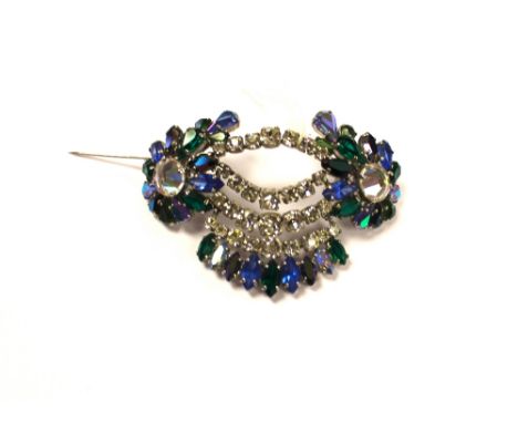 A Christian Dior 1950s brooch, set with clear, blue, green and iridescent paste stones, stamped to reverse Chr.Dior 1959, 7.5