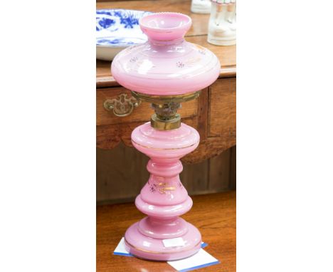 A 19th Century pink glass oil lamp, converted to electricity