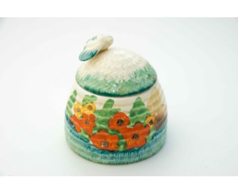 Clarice Cliff for Wilkinson, a 'Hollyhocks' beehive honey pot, Bizarre marks, (a/f)