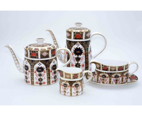 A Royal Crown Derby 1128 pattern part tea and coffee service, comprising coffee pot, teapot, milk jug, sauce boat and stand, 