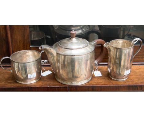 ***AMENDED GUIDE PRICE*** An Elizabeth II, 3 piece silver tea service, the teapot with a wood handle and finial, maker Benjam