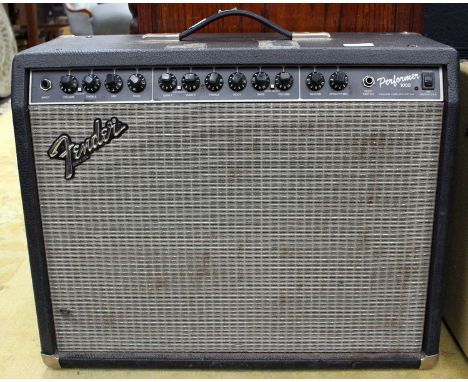 ****AUCTIONEER TO ANNOUNCE ITEM HAS PASSED ITS PAT TEST***A Fender performer 1000 amplifier