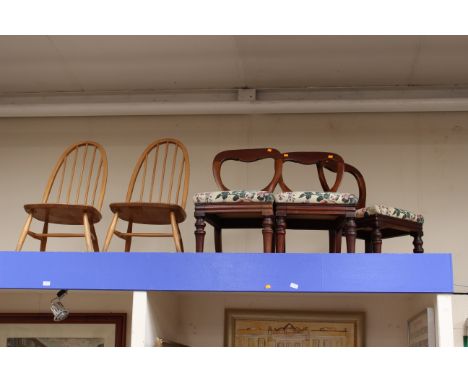 Three Victorian mahogany dining chairs, raised on turned legs, together with a pair of late 20th Century Ercol elm seated hoo
