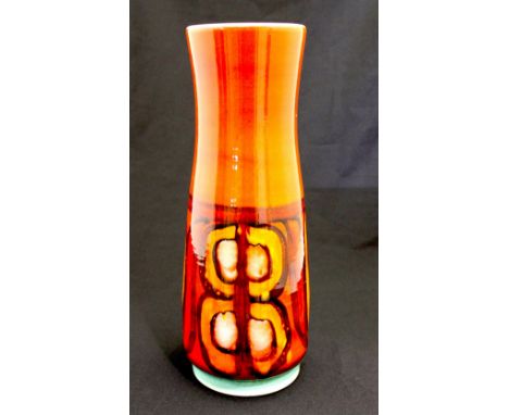 A Poole Pottery vase, shape number 85, in red and orange tones, stamped and signed to base, 40 cm high