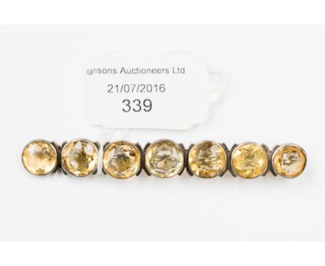 A Victorian silver citrine seven stone bar brooch, approx. 85 mm long