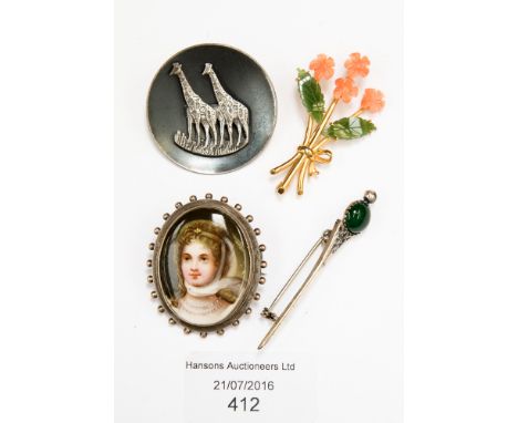 A 19th Century German porcelain brooch with white metal surround, also a silver Scottish pin a Chinese yellow metal coral and