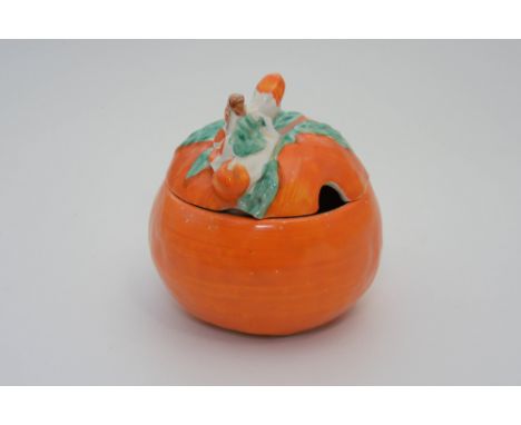 Clarice Cliff for Newport Pottery an orange marmalade pot, in the form of an orange 