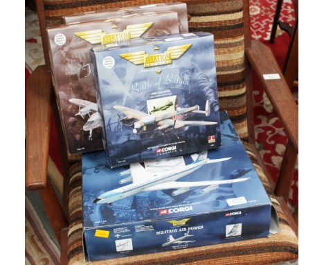 A boxed internal combustion engine, three boxed Titanic kits, ten Airfix kits, four military model planes