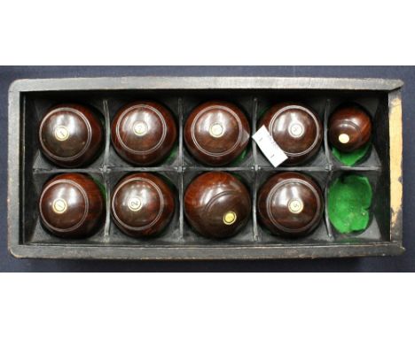 A set of Victorian and miniature or carpet bowls, lignum vitae including jack, each set with ivorine numbers 1 to 4 in later 