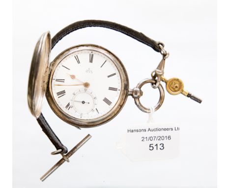 A hallmarked sterling silver pocket watch, London 1881, white enamel dial with Roman numerals with key and leather fob strap.