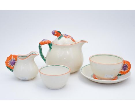 Clarice Cliff for Newport Pottery, on orange 'Marguerite' tea for one set, including teapot, milk, sugar, cup and saucer (5) 