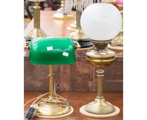 A brass and metal desk lamp with green glass shade and a 19th Century brass oil lamp (2)