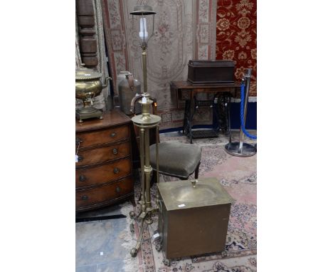 A brass telescopic lamp and an Arts and Crafts style coal bin (2)